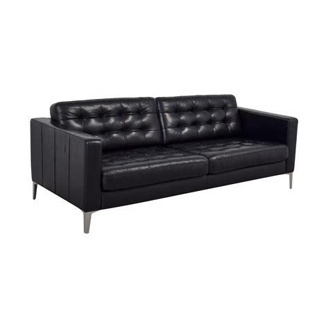 Light and easy to move around with removable tray top, handy for serving snacks. . Ikea black couch